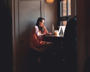 Small business owner taking a quiet moment to reflect and realign their business direction.