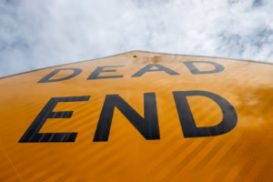 a close up of a dead end sign